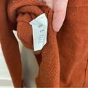 Kerisma Burnt Orange v neck high low sweater size small Photo 4