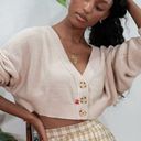 Urban Outfitters bdg ‘mari’ cropped cardigan sweater with buttons in beige  Photo 0