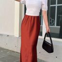 Boutique NWT Satiny Burgundy Maxi Skirt Photo 1