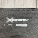 Xersion fitted athletic shorts with no slip hem, black and grey women size Large Photo 2