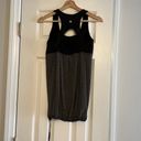 Lululemon Black and gray tank top with built in sports
bra.Size: 8. Photo 1