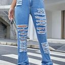 SheIn Ripped Raw Hem Jeans Photo 0