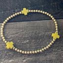 ENewton Yellow Cross Bracelet Photo 0