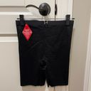 Spanx  Thinstincts 2.0 High-Waisted Mid-Thigh Short in Black Medium Photo 5