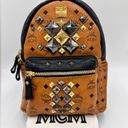 
COGNAC MCM VISETOS STARK
STUDDED BACKPACK MEDIUM Photo 1