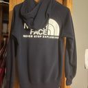 The North Face women’s navy hoodie Photo 1