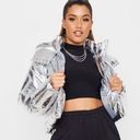 Pretty Little Thing  silver Metallic crop puffer jacket. Size 2 Photo 0