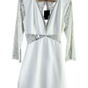 NBD NWT  x Revolve White Lace Long Sleeve Open Back Mini Dress, Size Large Photo 0