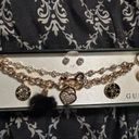 Guess lose angels  bracelet with matching earrings set Photo 0