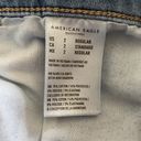 American Eagle -SUPER HIGH RISE JEGGING-SIZE 0/S Super high rise blue jegging, has stretch, excellent condition  Measurements: Waist: side to side 13 inches  Rise: 9 1/2 inches  Inseam: 25 1/2 inches Photo 7