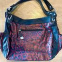 Black Rivet Like new  animal print large hobo shoulder bag. Mint condition. Sz 20”x12.5” Photo 1