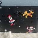 Coach Disney x  Corner Zip Holiday Print Wristlet Photo 1