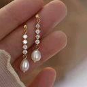 Elegant white pearl dangle drop earrings for women Gold Photo 1