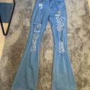 SheIn Ripped Raw Hem Jeans Photo 1