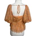 Free People  Penelope Printed Smocked Peplum Top Orange Size L Photo 2