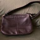  brown shoulder bag. Inside zip pocket. Zip closure. DKNY marking on strap Photo 0