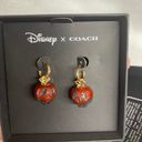 Coach  Disney Villain Poison Apple Huggies Earrings Photo 0