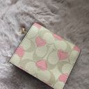 Coach Snap Wallet In Signature Canvas With Heart Print Photo 9