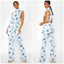 Pretty Little Thing  White Blue Floral Scuba High Neck Tie Waist Jumpsuit Size 12 Photo 1