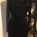 Marilyn Monroe  Black Mini Dress With Sheer Sleeves And Cut Outs Photo 0