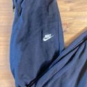 Nike  sportswear club fleece, women’s mid-rise joggers. Photo 0