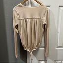 Free People  turnt bodysuit blossom pearl NWT size small Photo 5