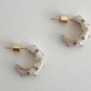 Gold Hoop Earrings With White Enamel Finish And Cubic Zirconia Photo 2