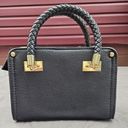 Bebe Black Footed 2-Handled Handbag Raised Spell out Logo Photo 2