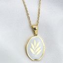 Gold Plant Irregular Shaped Pendant Necklace Photo 1