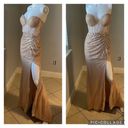 Cinderella Divine Women’s formal sparkly dress size 4
Brand is 
Rose gold color Photo 1