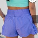 Pink Lily ⭐️SALE⭐️ NWT Flow And Chill Neon Purple Nylon Smocked Waist Running Shorts Photo 4