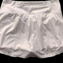 Athleta  WHITE RUN WITH IT TENNIS SKORT (S) Photo 4