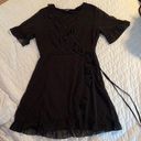 Black ruffled polka dot mini dress Size M Photo 0