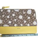 DKNY  Logo Wristlet Pouch Clutch Zipper Bag Daisies Saffron Leather Yellow Brown Photo 7