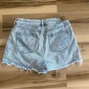 American Eagle  Woman’s Light Wash High Rise Raw Hem Distressed Shorts Size 8 Photo 1