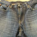 Uniqlo  mid rise, straight leg, regular fit jeans in women’s size 29. Photo 6