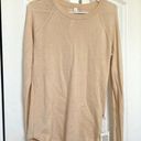 Lululemon  nwt sit in lotus sweater sz 8 small holes on right shoulder Photo 0