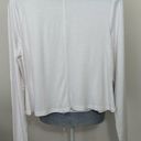 Apana M EUC white long sleeved athletic shirt. Photo 2