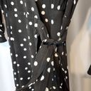 LULU’S BLACK AND WHITE POLK DOT TIERED RUFFLE 3/4 SLEEVE MIDI TIE WRAP DRESS Photo 1