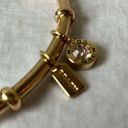 Coach: Gold Tone Charm Braclet- 2 charms- coach tag & rhinestone- open/slide on Photo 1