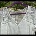 Buttons 👚White top/blouse w/lace detail & front . Either M or L. Never worn. Photo 1