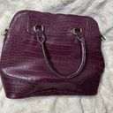 Liz Claiborne  purple pebble handbag. Cell phone pocket in back. Zip closure. Photo 2