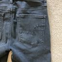 American Eagle  high rise distressed black jegging jeans in size 00 Photo 4