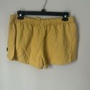 Patagonia  women’s yellow athletic drawstring shorts, size XL # Photo 3