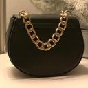 Charles and Keith Charles Keith Black Saddle Bag With Gold Chain Detail Photo 2