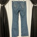 Bebe  women’s denim blue jean flare bottoms , rhinestones on back pockets Photo 4