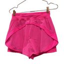 Sweaty Betty  Neon/ sonic pink athletic shorts.  Size small Photo 10