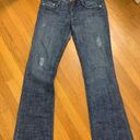 Bebe flare jeans with gold pockets Photo 1