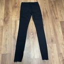 frame denim FRAME Le Skinny De Jeanne Mid Rise Side Slit Jeans Black Film Noir Raw Hem 25 Photo 1