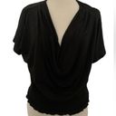 The Moon Olivia Ladies Top. Versatile, Plunge Neck Line. Capped Short Sleeves. Photo 1